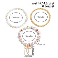 Thumbnail for Baroque 3pcs Bowknot Pendant Pearl Floral Acrylic Beaded Bracelet Set - ArtGalleryZen