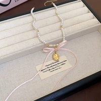 Thumbnail for Baroque Pink Ribbon Bowknot Relief Pendant Pearl Necklace - ArtGalleryZen