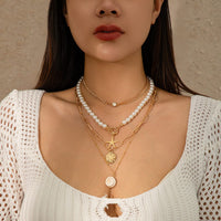 Thumbnail for Boho 4Pcs Crystal Inlaid Starfish Conch Pendant Pearl Chain Necklace Set - ArtGalleryZen