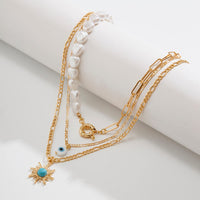 Thumbnail for Boho Layered Evil Eye Turquoise Sun Pendant Paperclip Pearl Chain Necklace Set - ArtGalleryZen
