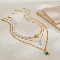 Thumbnail for Boho Layered Evil Eye Turquoise Sun Pendant Paperclip Pearl Chain Necklace Set - ArtGalleryZen