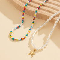 Thumbnail for Boho Layered Seed Bead Starfish Pendant Pearl Chain Necklace Set - ArtGalleryZen