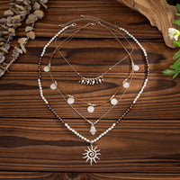 Thumbnail for Boho Layered Sun Hamsa Textured Round Disk Pendant Seed Beaded Necklace Set - ArtGalleryZen