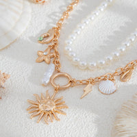 Thumbnail for Boho Layered Sun Starfish Lighting Pendant Pearl Chain Necklace Set - ArtGalleryZen