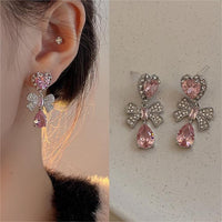 Thumbnail for Chic CZ Inlaid Crystal Ribbon Heart Dangle Earrings - ArtGalleryZen
