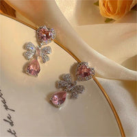 Thumbnail for Chic CZ Inlaid Crystal Ribbon Heart Dangle Earrings - ArtGalleryZen