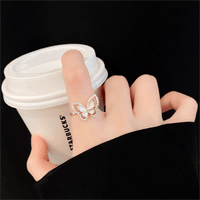 Thumbnail for Chic CZ Inlaid Natural Pearl Shell Duo Butterfly Ring - ArtGalleryZen