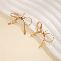 Thumbnail for Chic Gold Silver Tone Ribbon Earrings - ArtGalleryZen