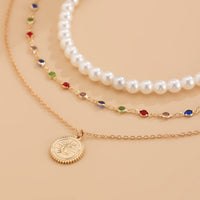 Thumbnail for Chic Layered Relief Round Disk Pendant Crystal Pearl Chain Necklace Set - ArtGalleryZen