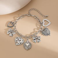 Thumbnail for Chic Silver Tone Pattern Heart Bowknot Pendant Bracelet - ArtGalleryZen
