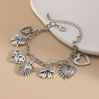 Thumbnail for Chic Silver Tone Pattern Heart Bowknot Pendant Bracelet - ArtGalleryZen