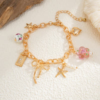 Thumbnail for Dainty Bowknot Flower Ceramic Beads Heart Pendant Bracelet - ArtGalleryZen
