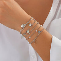 Thumbnail for Delicate Layered Heart Butterfly Star Tassel Pearl Cable Chain Bracelet Set - ArtGalleryZen