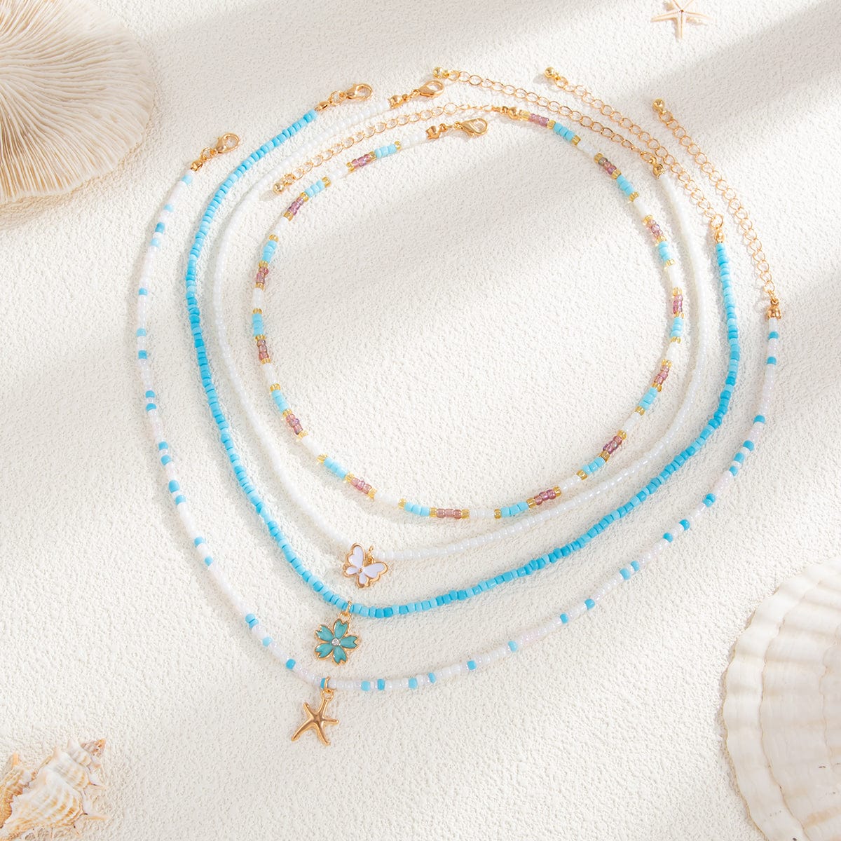 Elegant 4pcs Enamel Butterfly Flower Starfish Pendant Seed Beaded Necklace Set - ArtGalleryZen