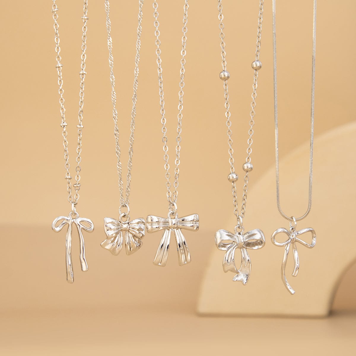 Elegant 5pcs Bowknot Charm Saturn Chain Necklace Set - ArtGalleryZen