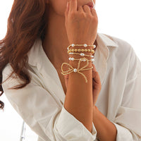 Thumbnail for Elegant 5pcs Gold Plated Bowknot Pearl Chain Bracelet Set - ArtGalleryZen