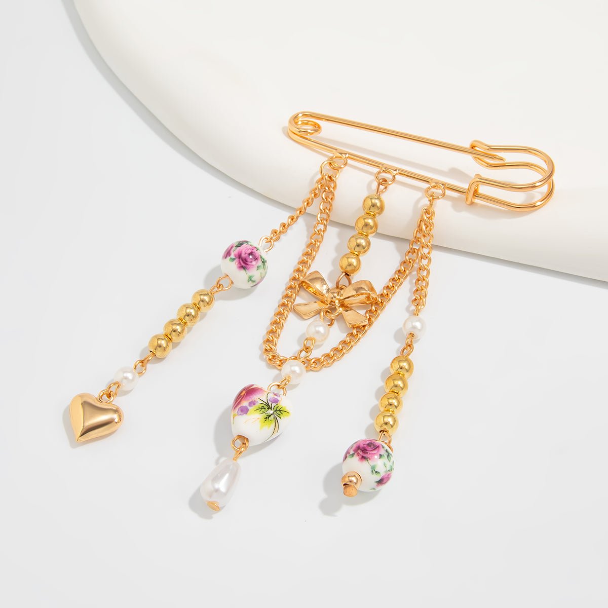 Elegant Floral Ceramic Beads Bow Heart Tassel Pin Brooch - ArtGalleryZen