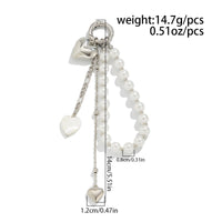 Thumbnail for Elegant Heart Shell Pendant Pearl Keychain - ArtGalleryZen