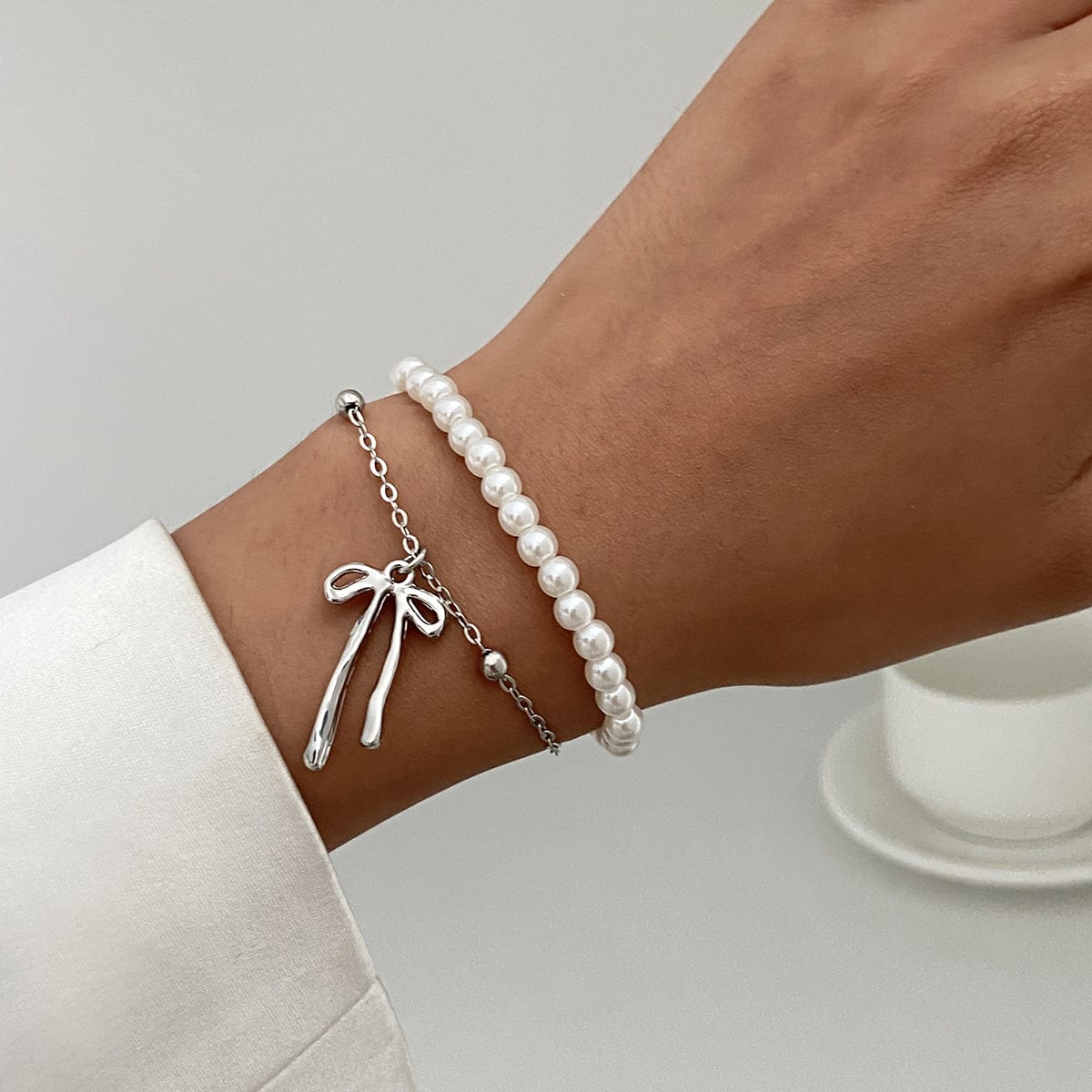 Elegant Layered Bowknot Pendant Pearl Chain Bracelet - ArtGalleryZen