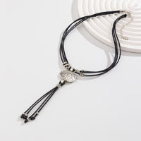 Thumbnail for Ethnic style Layered Carved Oval Charm PU string Tassel Necklace - ArtGalleryZen