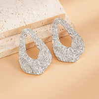 Thumbnail for Geometric Hollow Pleated Waterdrop Stud Earrings - ArtGalleryZen