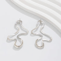 Thumbnail for Minimalist Irregular Hollow Pattern Stud Earrings - ArtGalleryZen