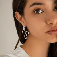 Thumbnail for Minimalist Irregular Hollow Pattern Stud Earrings - ArtGalleryZen
