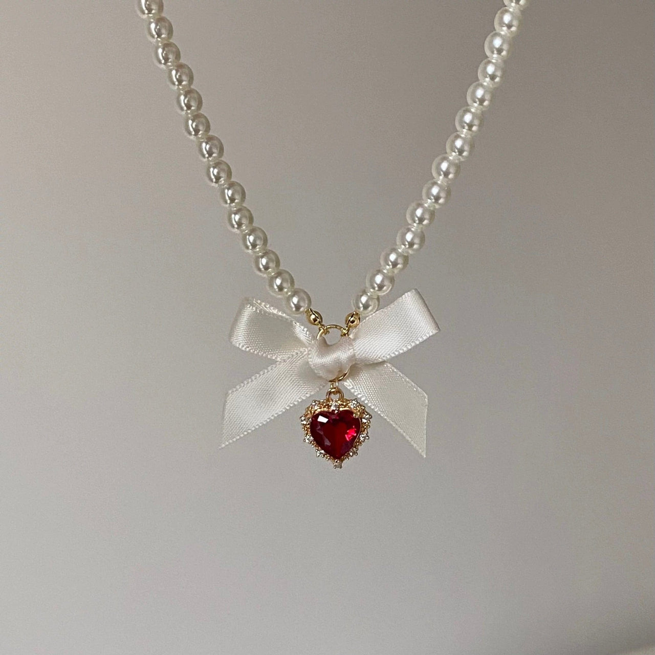 Sweet CZ Inlaid Heart Ribbon Bowknot Pendant Pearl Chain Necklace - ArtGalleryZen