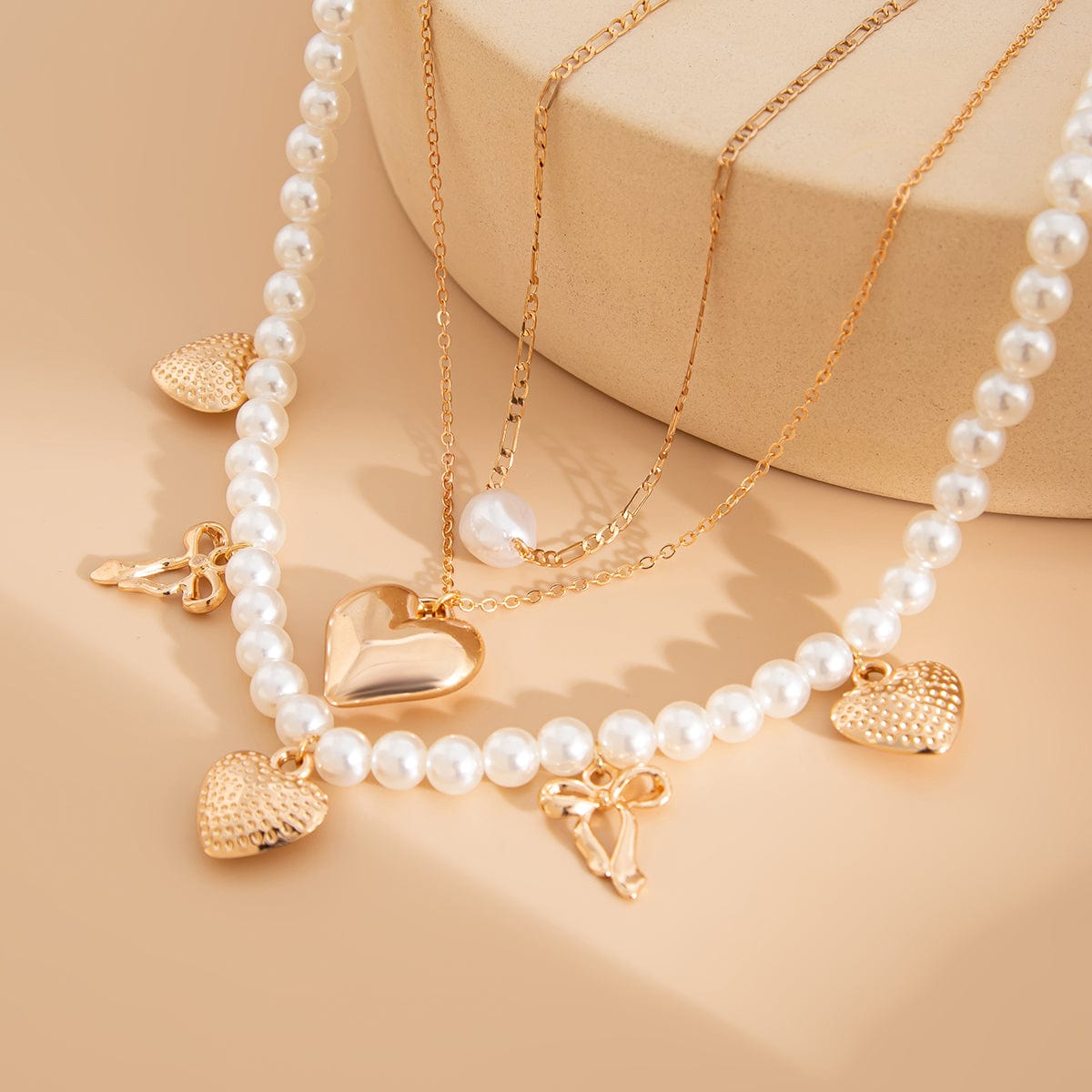 Trendy 3pcs Bowknot Heart Pendant Pearl Chain Necklace Set - ArtGalleryZen