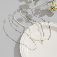 Thumbnail for Trendy Layered Bowknot Charm Star Pearl Chain Necklace Set - ArtGalleryZen