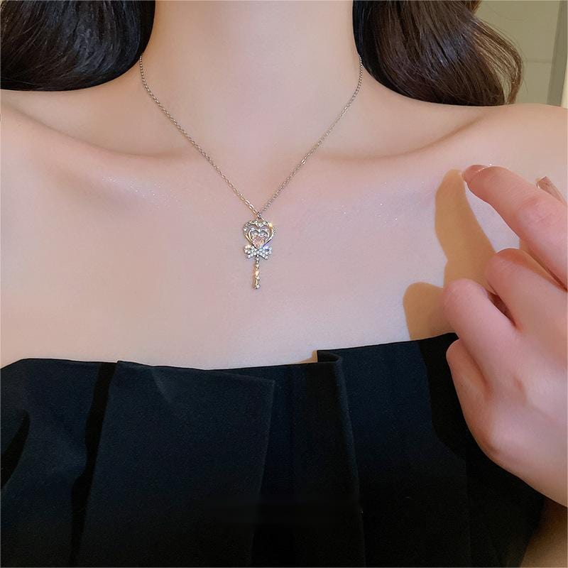 Chic CZ Inlaid Bowknot Heart Magic Wand Necklace - ArtGalleryZen